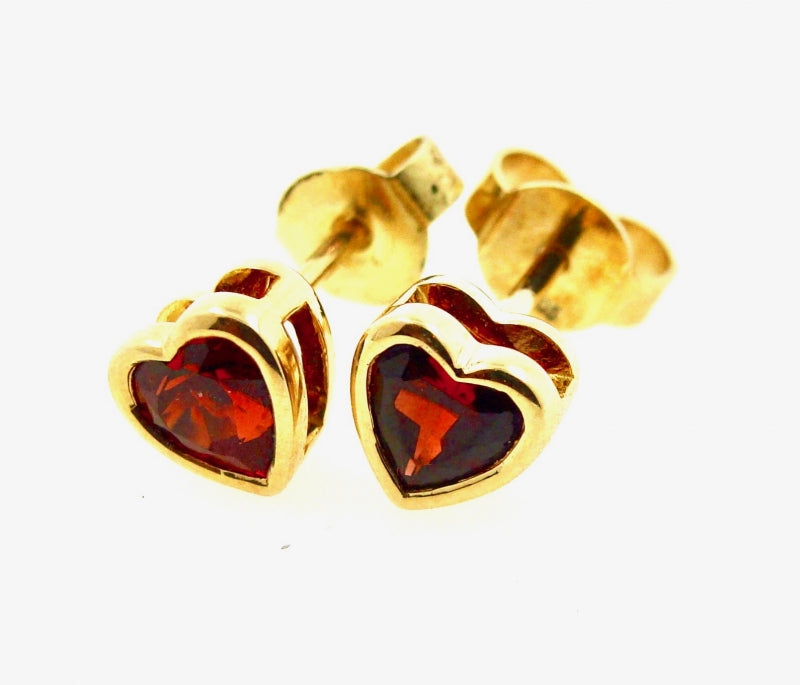 Gouden hart oorbellen met rode steen
